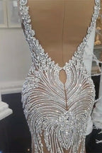 Abito da sposa sirena con cristalli splendenti, scollo a V, schiena scoperta, color champagne