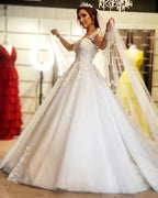 Hermosos vestidos de novia largos de corte A con hombros descubiertos y mangas