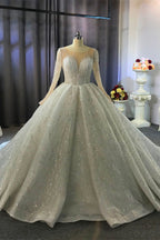 Splendido abito da sposa lungo a palloncino con scollo a barca e cristalli, con maniche