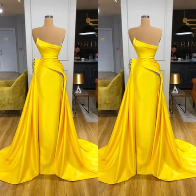 Superbe robe de bal longue jaune en ligne A, sans manches, ornée de paillettes