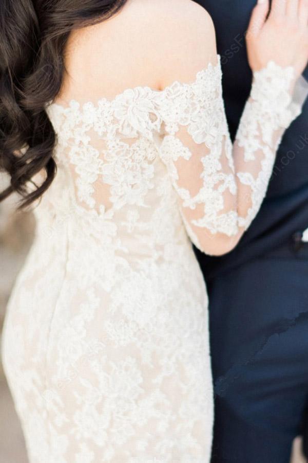 Magnifique robe de mariée sirène ivoire en dentelle à manches longues et épaules dénudées