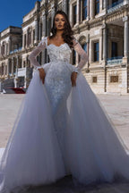 Splendido abito da sposa sirena in pizzo a maniche lunghe con strascico staccabile a cuore