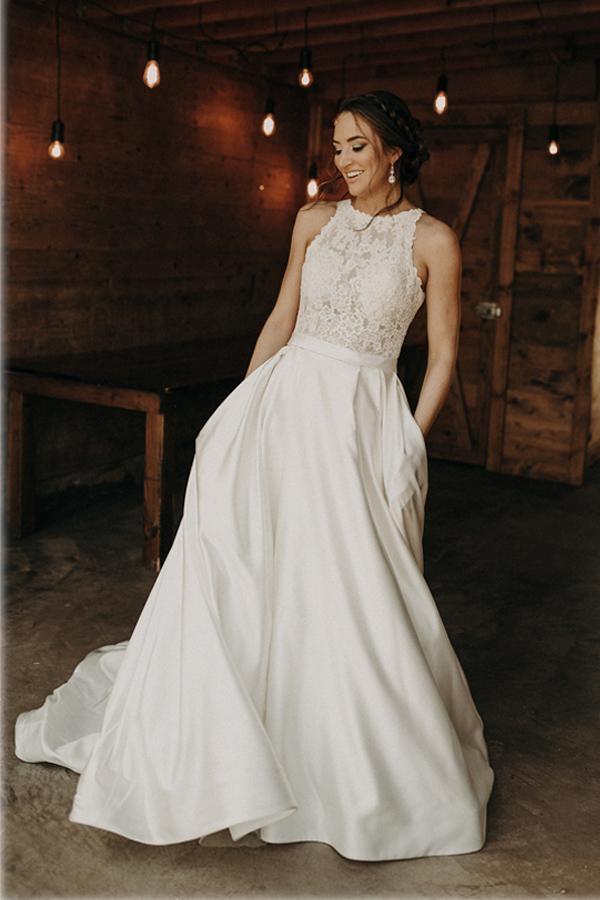 Neckholder-Brautkleid in A-Linie mit Illusions- und Spitzendetail und Schleppe
