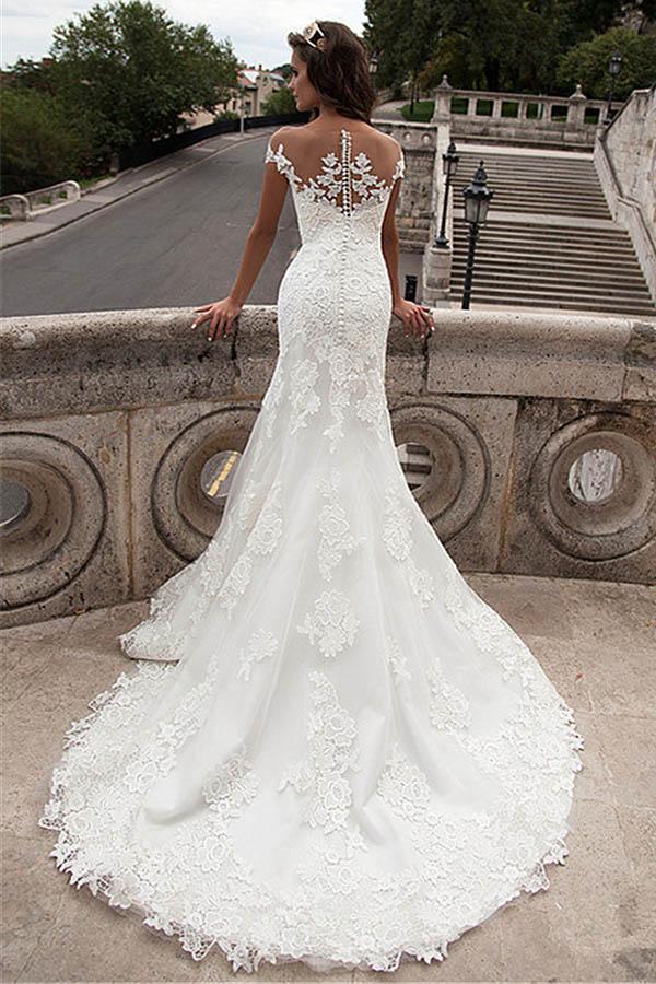 Vestidos de novia largos de sirena con encaje y escote ilusión