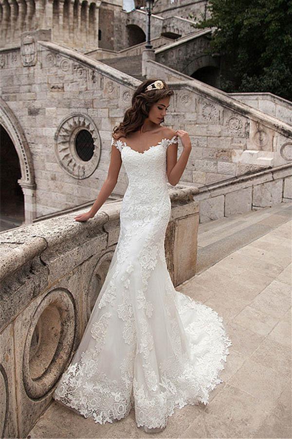 Vestidos de novia largos de sirena con encaje y escote ilusión