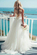 Robe de mariée ivoire en tulle à fines bretelles en forme de cœur Destination