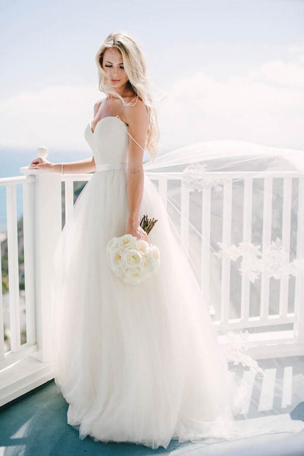 Robe de mariée ivoire en tulle à fines bretelles en forme de cœur Destination