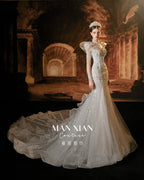 Ethereal Crystal Beaded Mermaid Wedding Dress with Cathedral Train & Statement Collar