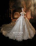 Regal Off-Shoulder Ruffled Ball Gown Wedding Dress with Cathedral Train & Crystal Beading