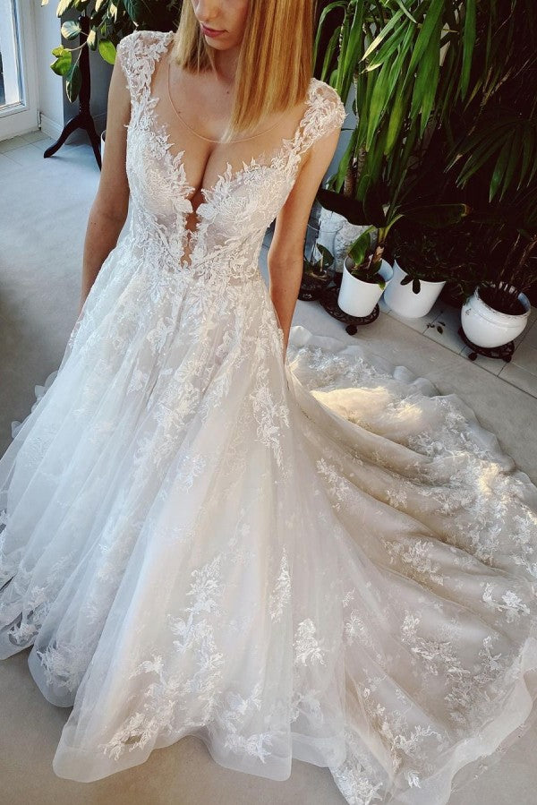 Vestido de novia largo de corte A con apliques de encaje, espalda descubierta y cola de iglesia