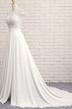 Vestido de novia largo de gasa con encaje, apliques y corte en A con abertura