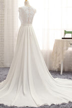 Vestido de novia largo de gasa con encaje, apliques y corte en A con abertura