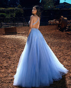 Robe de bal longue en tulle sans dos, à perles et paillettes, coupe évasée et col licou
