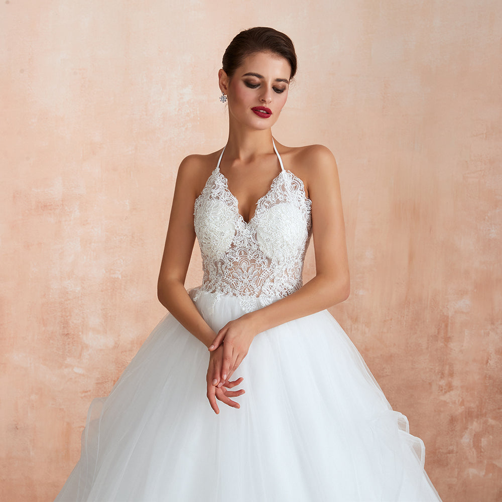 Vestido de novia largo de tul con escote halter, espalda abierta y apliques