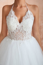Vestido de novia largo de tul con escote halter, espalda abierta y apliques
