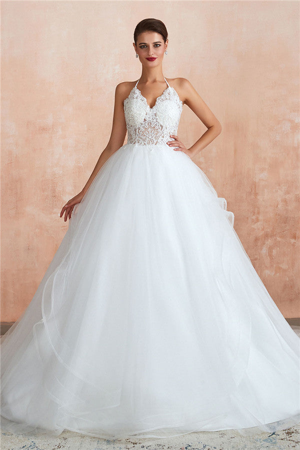 Vestido de novia largo de tul con escote halter, espalda abierta y apliques
