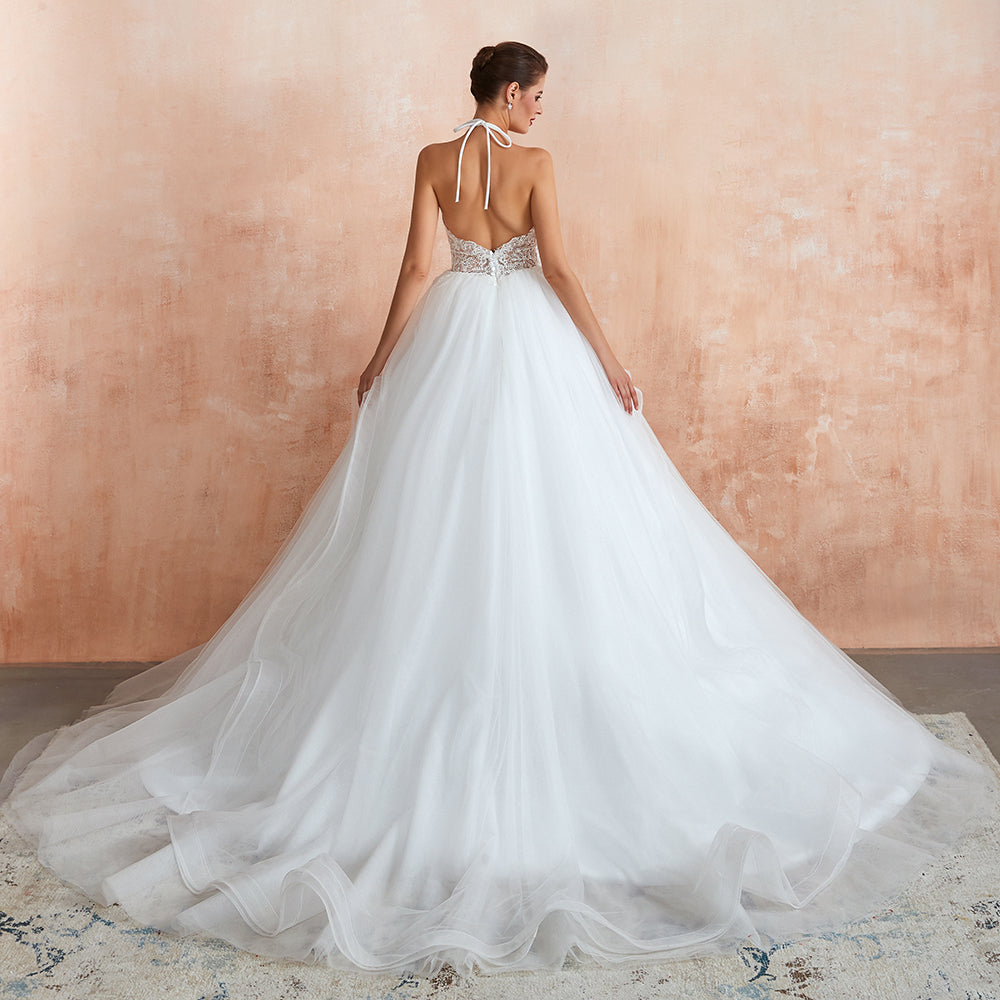 Vestido de novia largo de tul con escote halter, espalda abierta y apliques