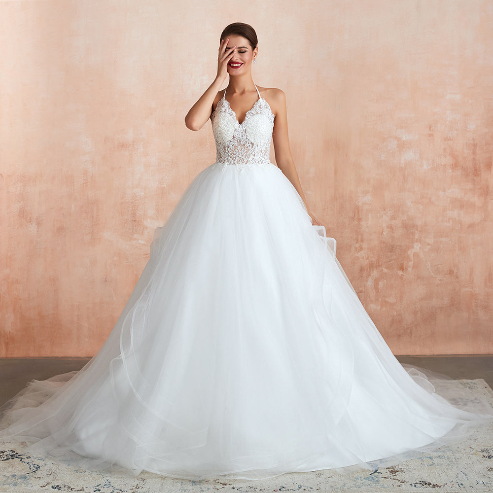 Vestido de novia largo de tul con escote halter, espalda abierta y apliques