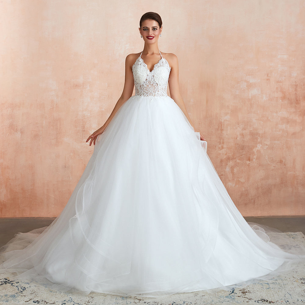 Vestido de novia largo de tul con escote halter, espalda abierta y apliques