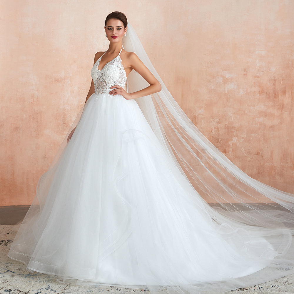 Vestido de novia largo de tul con escote halter, espalda abierta y apliques