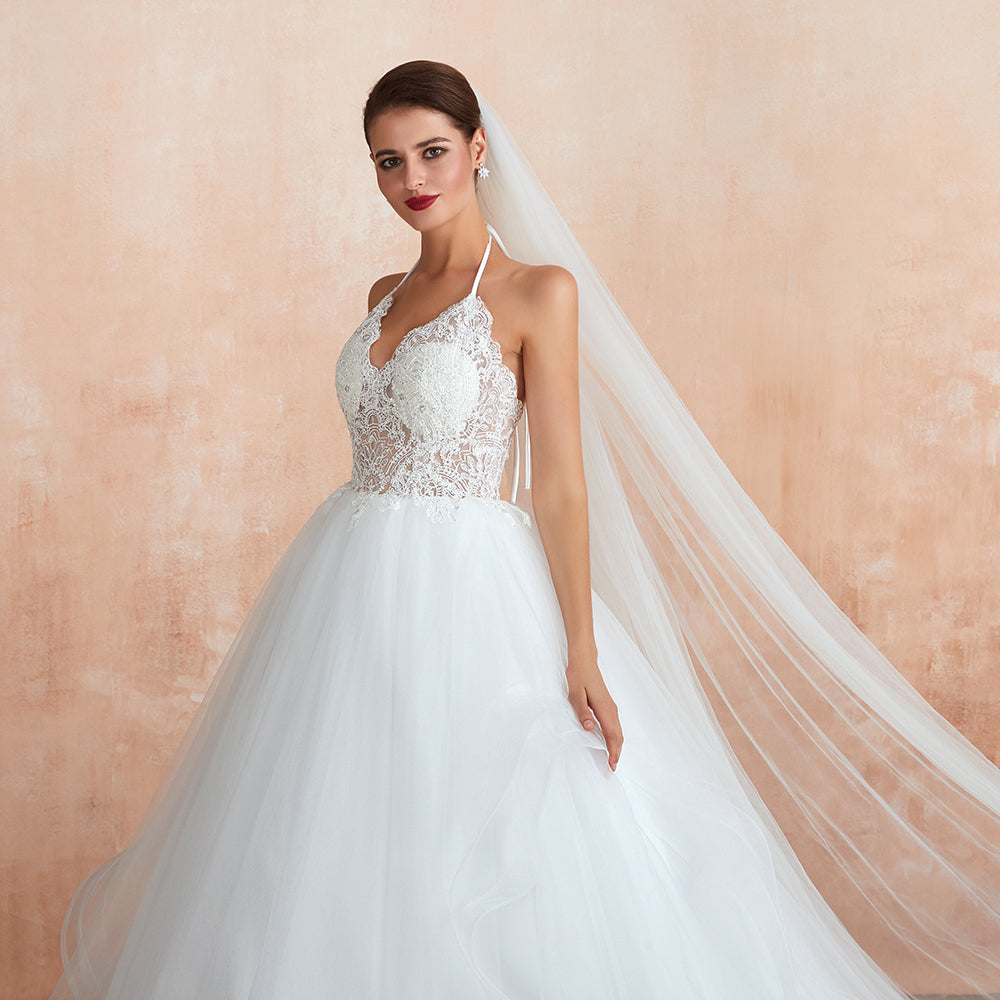 Vestido de novia largo de tul con escote halter, espalda abierta y apliques