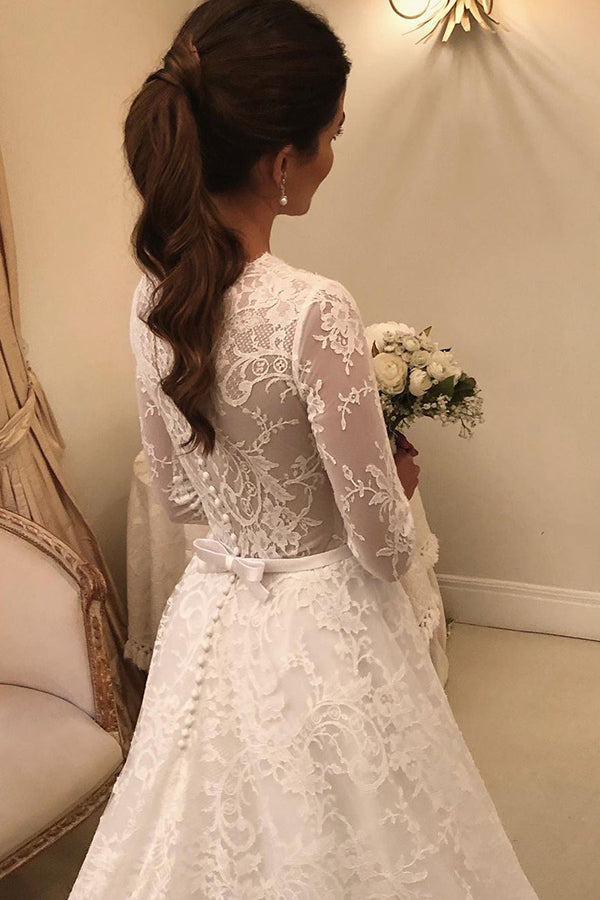 Vestido de novia largo de encaje con corte A y mangas