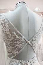 Vestido de novia largo de corte A con escote en forma de corazón, tul, cuentas, apliques de encaje y mangas