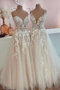 Vestido de novia largo de corte A con apliques de encaje de tul y espalda descubierta