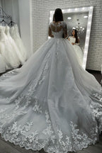 Vestido de novia largo de tul con apliques de corazón y encaje con mangas