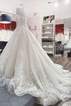 Abito da sposa lungo a palloncino con scollo a V, spalline sottili e pizzo in tulle