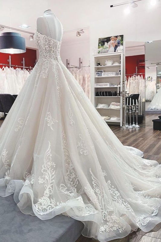 Abito da sposa lungo a palloncino con scollo a V, spalline sottili e pizzo in tulle