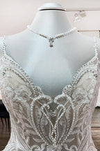Abito da sposa lungo a palloncino con scollo a V, spalline sottili e pizzo in tulle