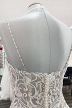 Abito da sposa lungo a palloncino con scollo a V, spalline sottili e pizzo in tulle