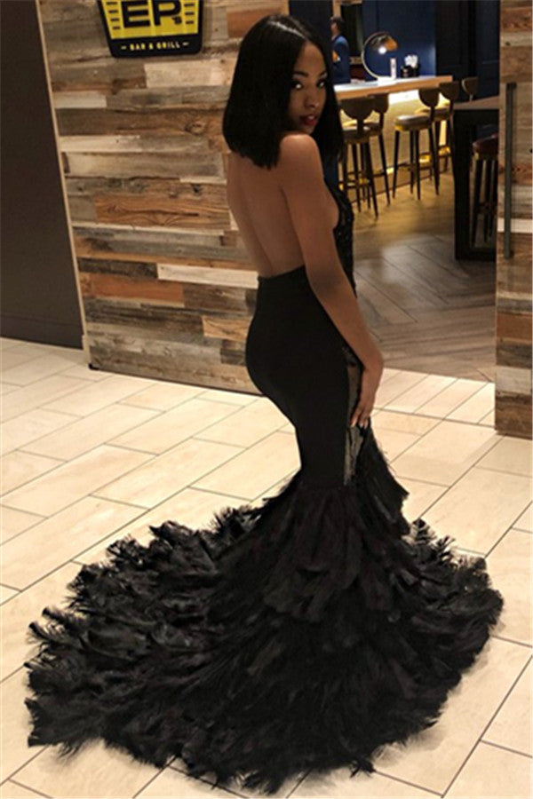Robe de bal noire longue sirène à col halter avec dos ouvert et appliques