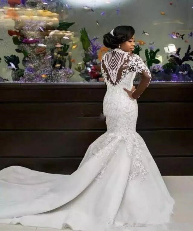 Vestido de novia largo de sirena con cuello alto, cuentas, apliques de encaje y mangas