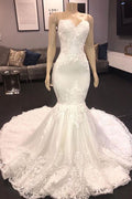 Robe de mariée en dentelle avec appliques en forme de sirène longue et décolleté cœur