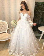 Vestido de Noiva Longo Princesa em Tule com Ombros Descobertos e Mangas Bufantes