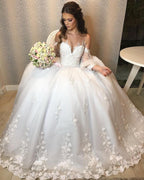 Vestido de Noiva Longo Princesa em Tule com Ombros Descobertos e Mangas Bufantes