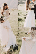 Robe de mariée à manches longues avec application en tulle et encolure dégagée