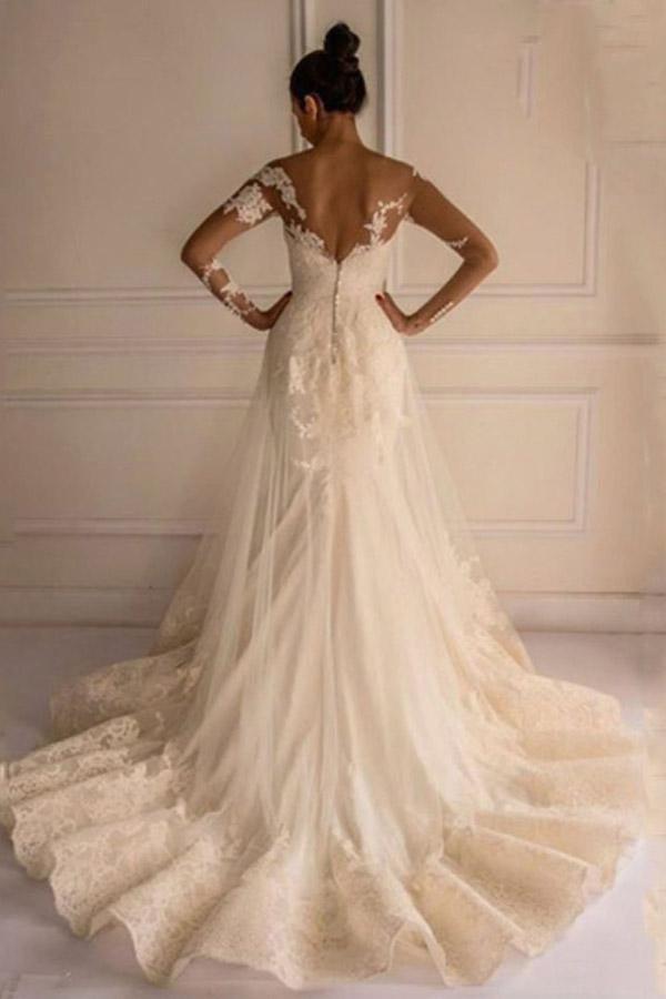 Vestido de novia estilo sirena con mangas largas, apliques, botones y largo hasta el suelo 