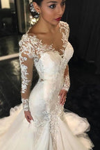 Robe de mariée ivoire à manches longues avec traîne courte et appliques en dentelle