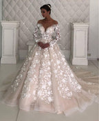 Robe de mariée à manches longues en dentelle, créateur leeves