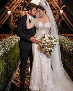 Robe de mariée en tulle à manches longues, style sirène, décolletée épaules nues avec dentelle appliquée