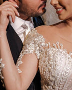 Robe de mariée en tulle à manches longues, style sirène, décolletée épaules nues avec dentelle appliquée
