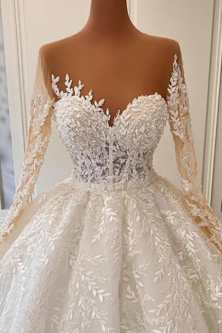 Robe de bal princesse luxueuse en dentelle à manches longues et coupe évasée
