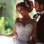 Abito da sposa lungo di lusso con corpetto a cuore, cristalli e perline, con maniche