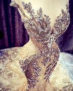 Abito da sera lungo di lusso a sirena con scollo a V e perline in tulle
