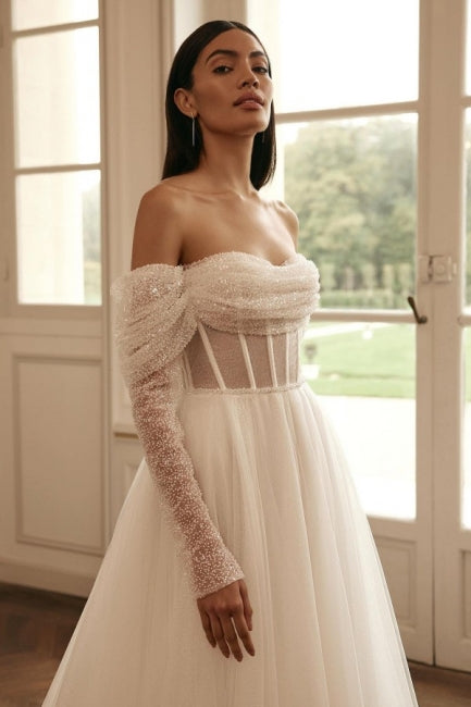 Vestidos de noiva luxuosos de mangas compridas, corte evasê, ombros descobertos, com lantejoulas