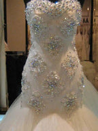 Robe de mariée sans manches en tulle à perles, décolleté cœur