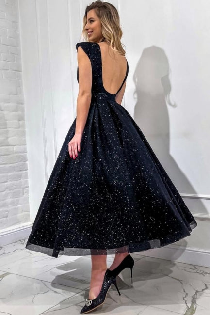 Abito da sera lungo nero a linea ad A con scollo a V senza maniche e paillettes